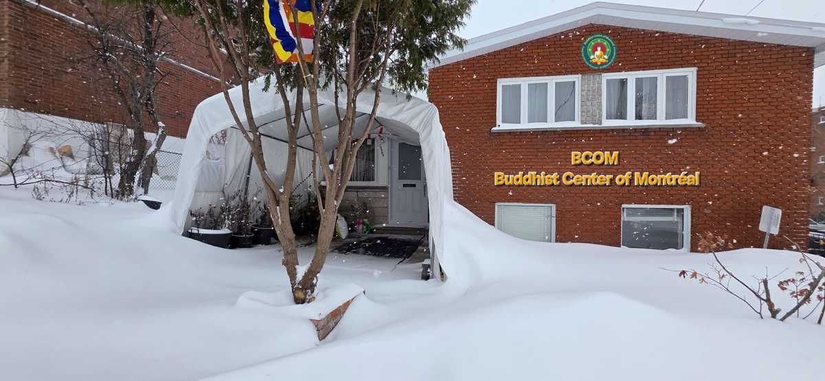 Front view of the Buddhist Centre of Montreal in winter